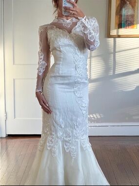 Stunning vintage wedding dress with petal embroidery
